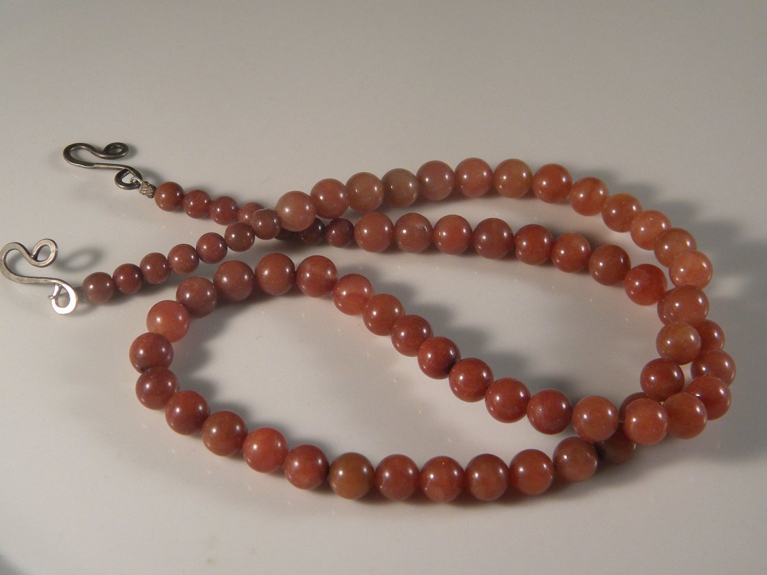 ANTIQUE CHINESE CARNELIAN BEAD NECKLACE: ANTIQUE CHINESE CARNELIAN BEAD NECKLACE, BEAD SIZE FROM 5mm-8mm. Total length 22". Silver hook at the end.