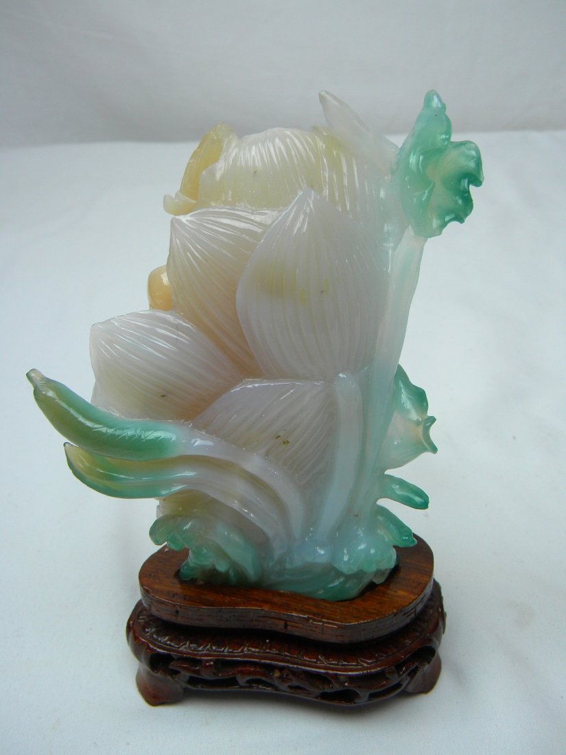 ANTIQUE CHINESE AGATE STATUE LOTUS FLOWER AND BOY: ANTIQUE CHINESE AGATE STATUE LOTUS FLOWER AND BOY, SIZE: 6" TAll including wood base, 4" WIDE.