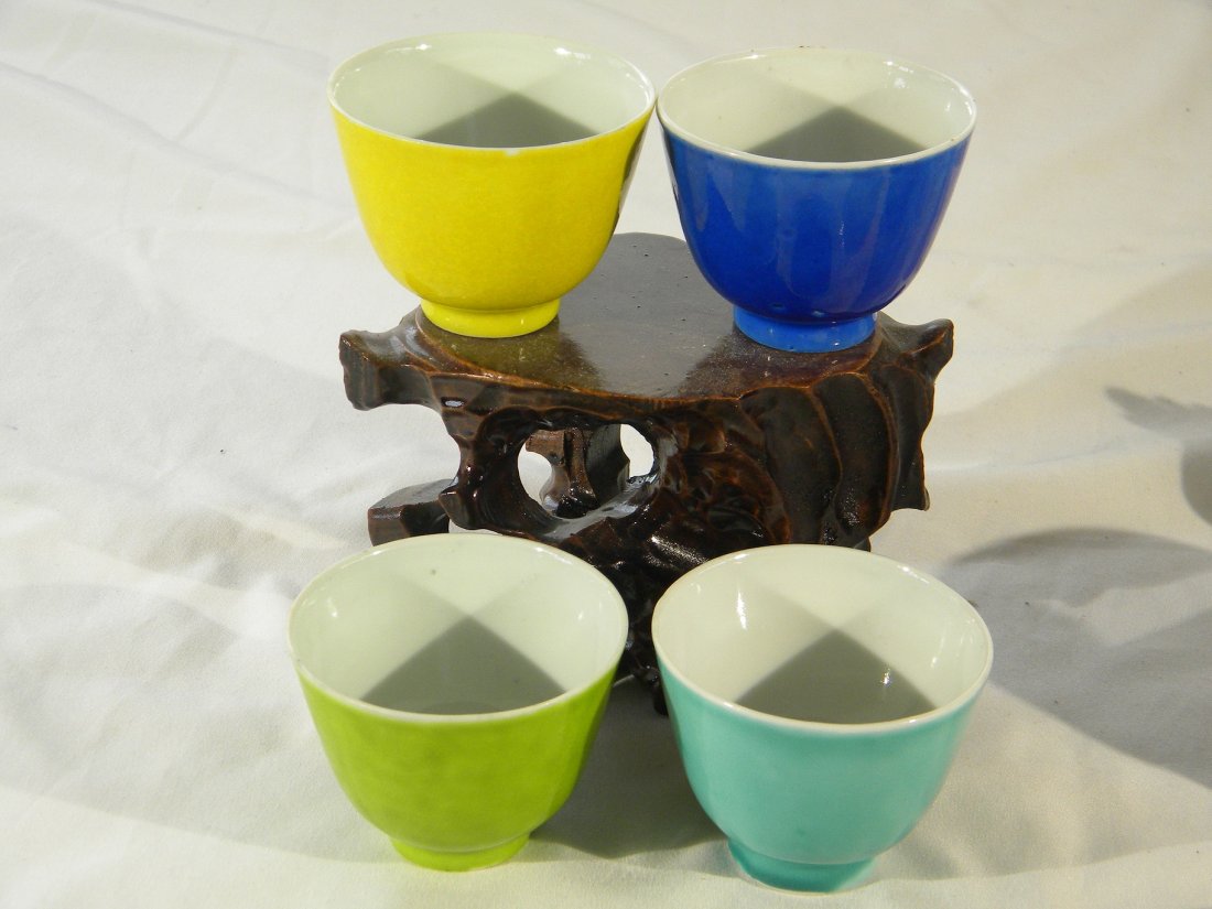 FOUR CHINESE ANTIQUE BLUE YELLOW AND GREEN GLAZED CUPS,: FOUR CHINESE ANTIQUE BLUE YELLOW AND GREEN GLAZED CUPS, MARKED CHINA AT THE BOTTOM. DATED LATE QING OR REPUBLIC PERIOD. SIZE:H: 2-1/4, W: 2-3/4".