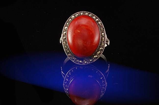 ANTIQUE CHINESE SILVER CORAL RING: ANTIQUE CHINESE SILVER CORAL RING, 800 SILVER MARCASITE c. 1930 ring size 61/2. The ring has a marvelous natural and untreated red corals (16 x 12 mm. weight 9.2ct) with 800 silver marcasite decoratio