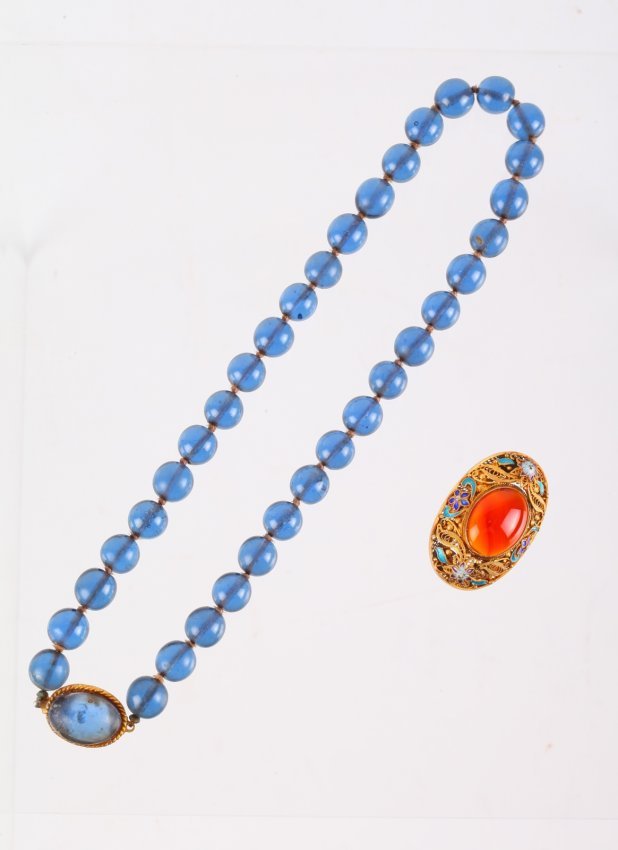 ANTIQUE BLUE PEKING GLASS NECKLACE AND CARNELIAN BROOCH: ANTIQUE BLUE PEKING GLASS NECKLACE AND CARNELIAN BROOCH SET, LENGTH OF THE NECKLACE 16", BLUE BEAD SIZE 10mm, Brooch length 4cm