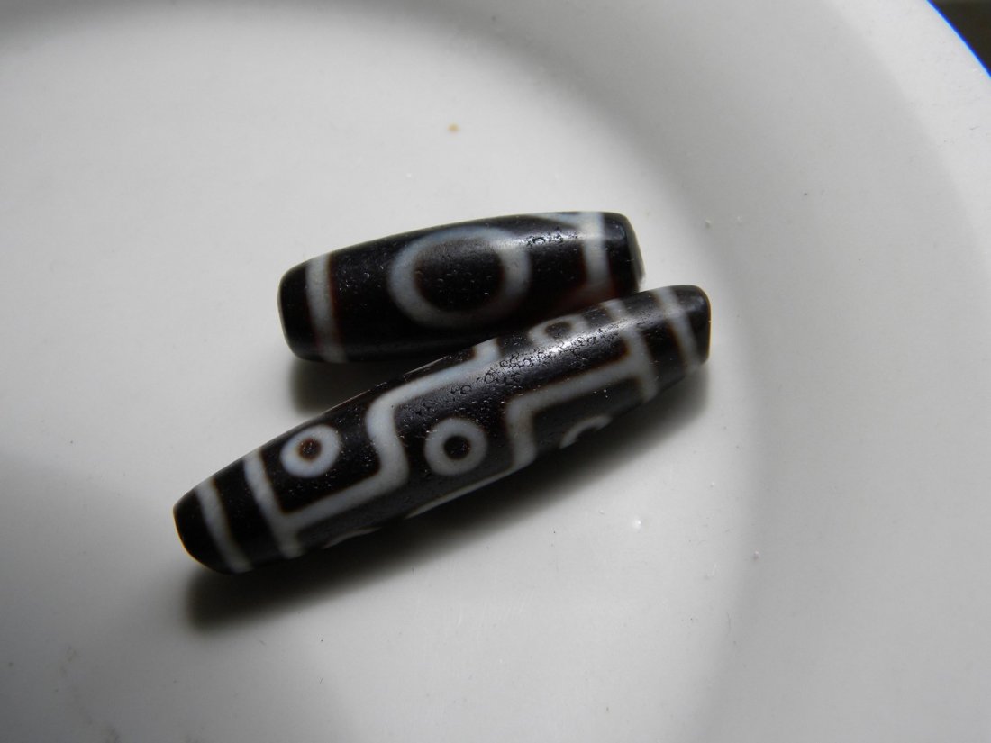 Pair of Antique Tibetan Dzi Beads (1 of 3)