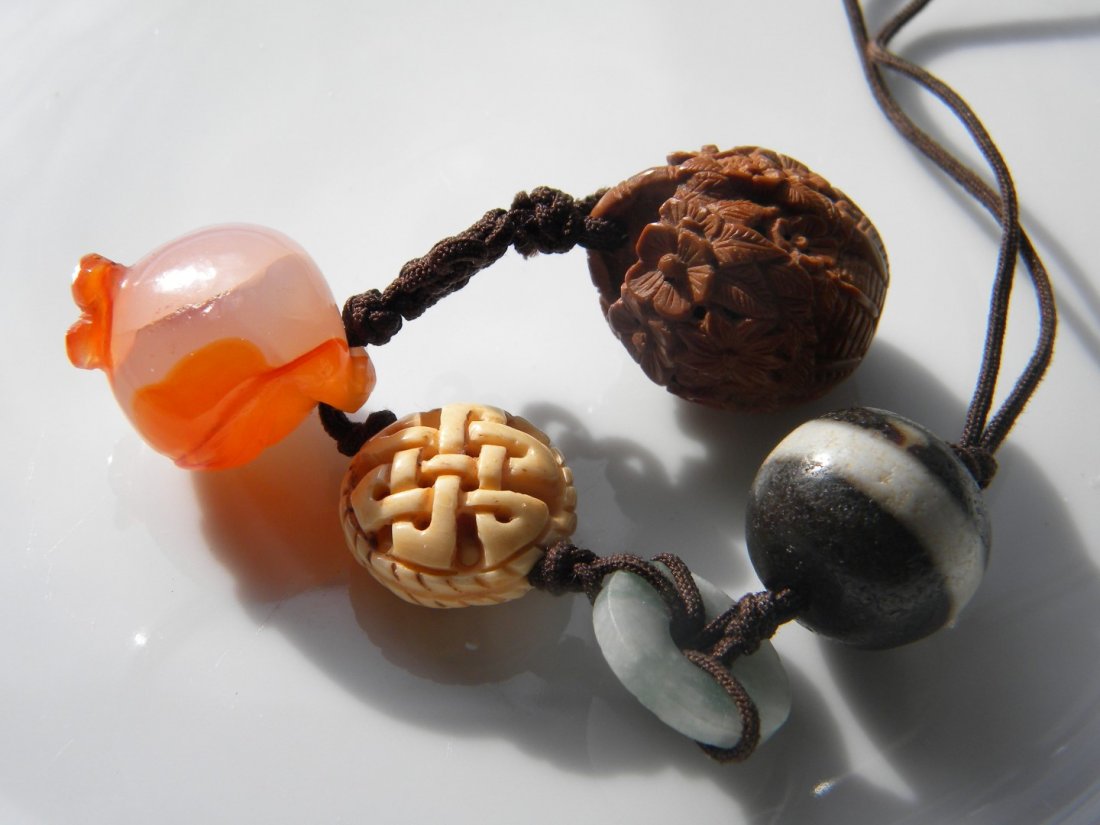 String of carved nut, Carnelian, Jadeite and Tibet Dzi: String of carved nut, Carnelian, Jadeite and Tibet Dzi Bead, size of the carved nut: 25mm x 23mm