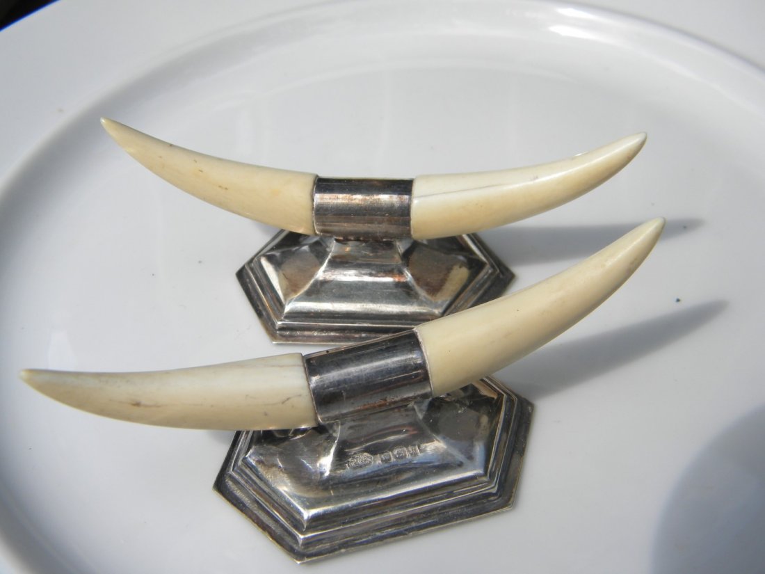 Pair of Statue on Silver Chopstick Holder: Pair of Statue on Silver Chopstick Holder, size: 3.5" x 1.25"