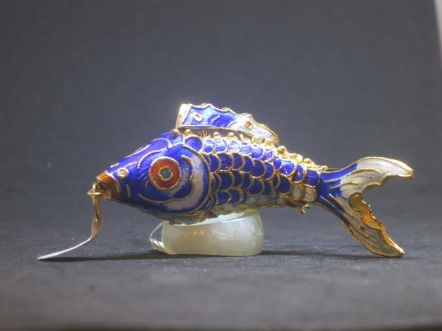 Articulated silver brass fish (1 of 4)