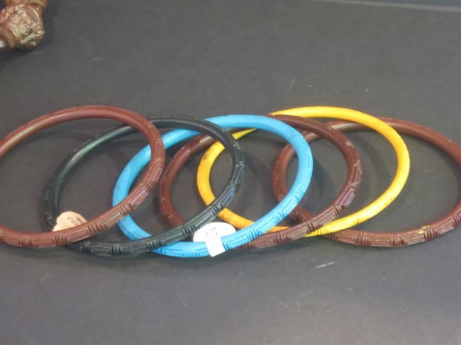 A lot of six old Chinese carved cinnabar bracelets (1 of 2)