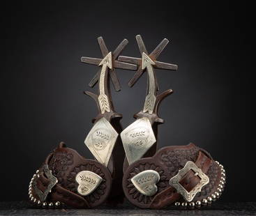 Fine pair of double mounted Spurs by noted Colorado Bit: Fine pair of double mounted Spurs by noted Colorado Bit & Spur Maker Bill Adamson, done in the Diamond Dick pattern, silver overlay arrow shanks, engraved fixed heart buttons, mounted with a pair of