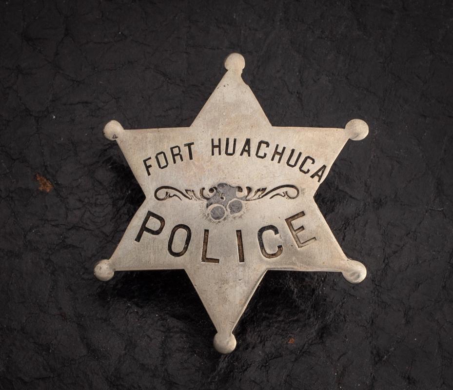 Fort Huachuca Police Badge, 6 point ball star, 2 1/2 ": Fort Huachuca Police Badge, 6 point ball star, 2 1/2 " across points, engraved in center of star, pin has been repaired. Military Fort Huachuca, AZ. was established March 3, 1877 by Capt. Saml. Whites