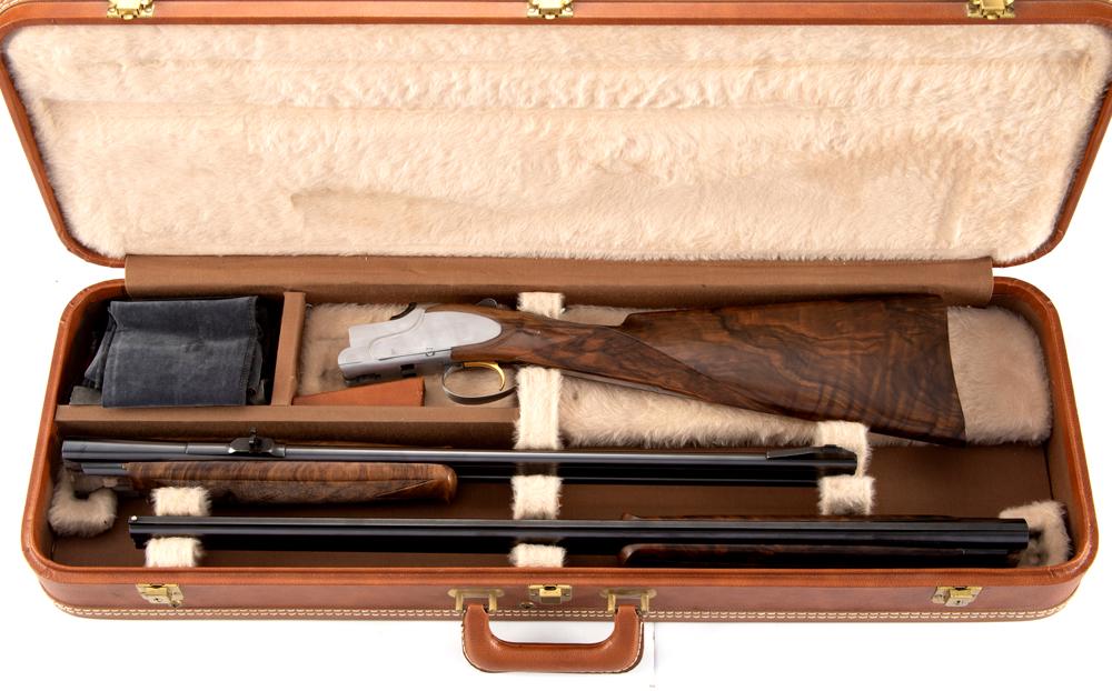 "Browning Belgium" marked two barrel: "Browning Belgium" marked two barrel Cased Set, .20 ga. over & under Shotgun / .30/06 caliber over & under Rifle, SN 177PMO1096, stainless receiver that has been buffed with 26 1/2", 20 ga. over & und