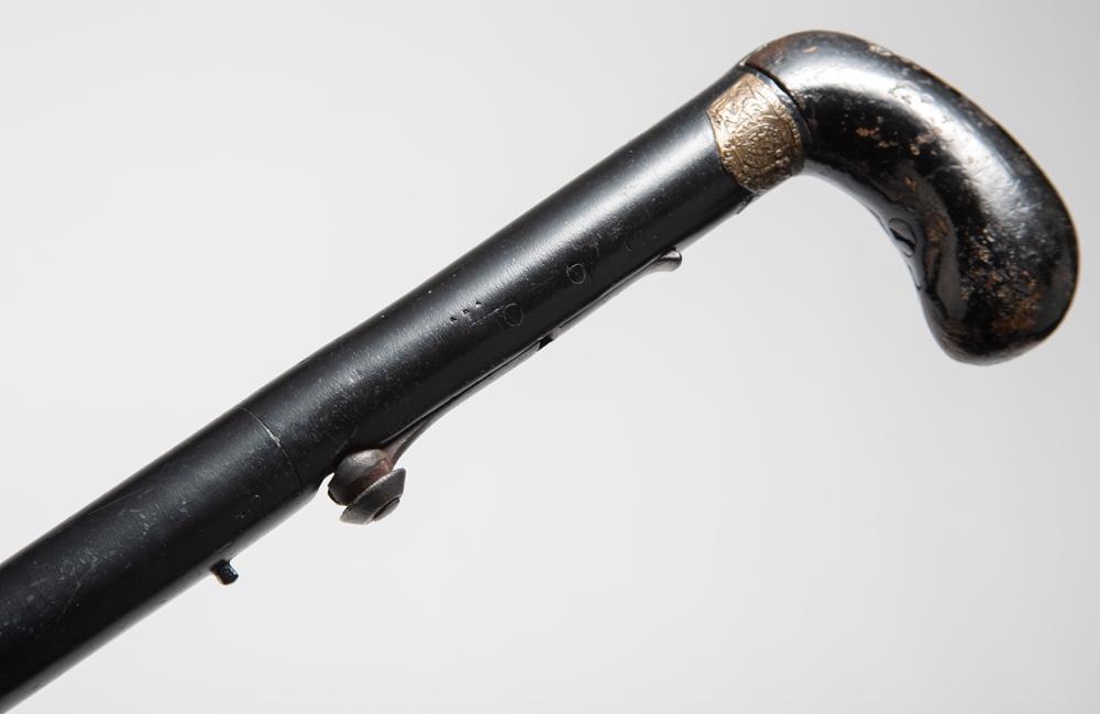 Antique Cane Gun, 30" steel barrel, barrel is marked: Antique Cane Gun, 30" steel barrel, barrel is marked "Day's" with patent markings, approximately 20 ga. bore, fires percussion cap and ball with hide away trigger, 4 1/2" tip of cane when removed expo