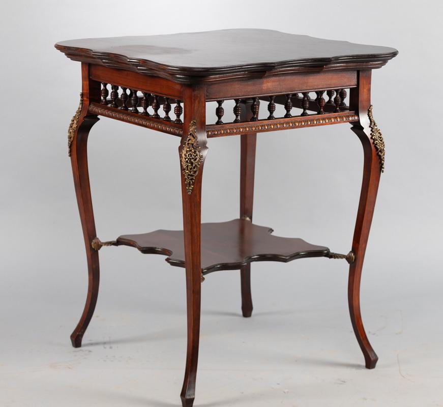 Fancy antique Lamp Table, circa 1915, with unique: Fancy antique Lamp Table, circa 1915, with unique turned 32 spindle skirt, fancy brass trim, and shaped stretcher. Table measures 39" T x 24" shaped square top, nice finish, good condition.