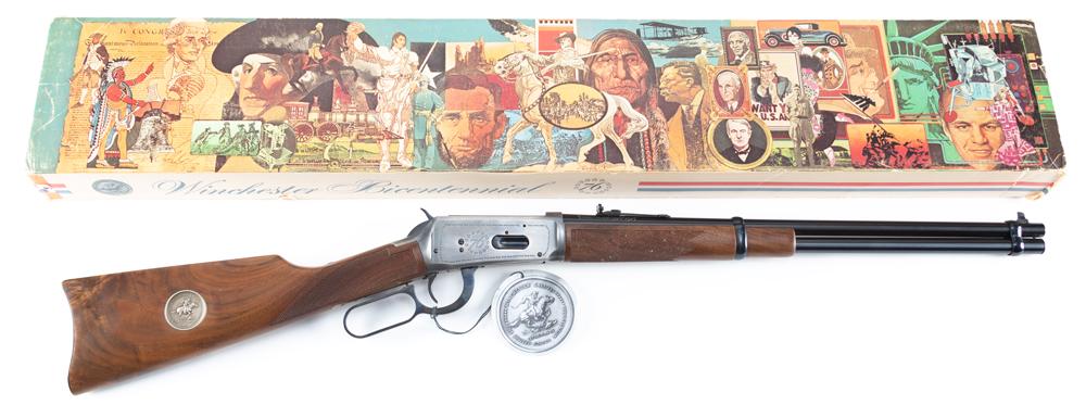 New In Box Winchester, Model 94, Bicentennial 76 lever: New In Box Winchester, Model 94, Bicentennial 76 lever action Carbine, SN USA08485, .30/30 caliber, blue finish, 20" round barrel, fancy checkered wood with inlaid medallion in stock, complete with ha