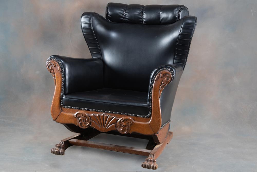 Very unique antique quarter sawn oak claw foot Platform: Very unique antique quarter sawn oak claw foot Platform Rocker, with unique and desirable upholstery with pleated border, across the arms measures 34 1/2" x 36" tall at back. HACKNEY ESTATE.