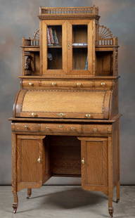 Extremely rare, possibly one of a kind antique, quarter: Extremely rare, possibly one of a kind antique, quarter sawn oak Ladies Cylinder Bookcase Desk, circa 1890-1900, measuring 36" wide x 21 1/2" deep x 70" tall. Incredible style with stick & ball and