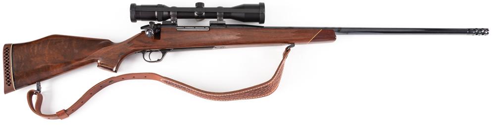 For the serious big game hunter this is a Weatherby,: For the serious big game hunter this is a Weatherby, Mark V, bolt action Rifle, .416 WBY MAG caliber, SN SB026547, 26" barrel with muzzle brake. Beautifully figured, high comb walnut stock, factory re
