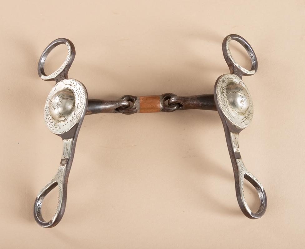 "Klapper" marked, unique engraved silver mounted: "Klapper" marked, unique engraved silver mounted Snaffle Bit, #55, with hand engraved raised silver conchos on cheek piece. Billy Klapper, Pampa, TX. Bit and Spur Maker.