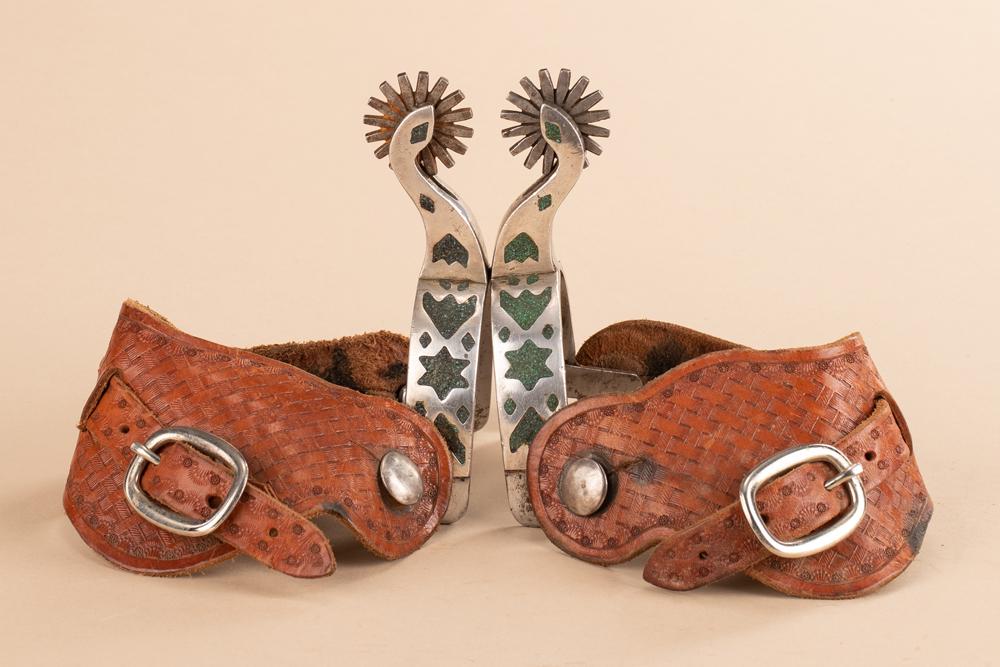 Very unique pair of double mounted sterling overlay: Very unique pair of double mounted sterling overlay Spurs by noted Lipscomb, Texas Bit and Spur Maker Wayne Paul, #2400, mounted with two-piece basket weave straps.
