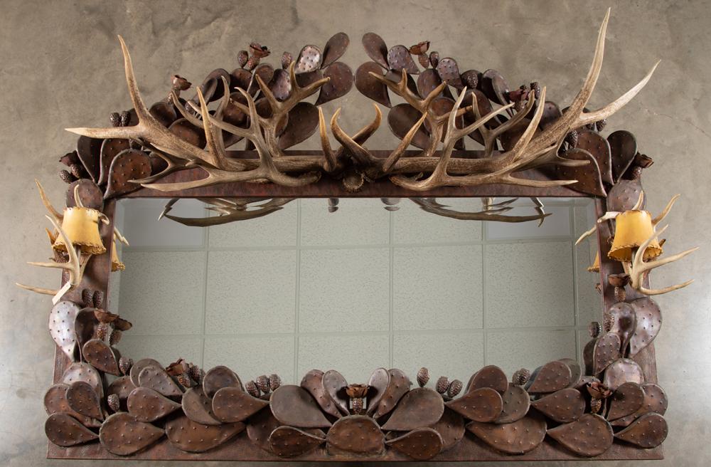 Incredible hand made copper Cactus & Horn Hanging: Incredible hand made copper Cactus & Horn Hanging Mirror made by the late Fredericksburg, Texas Artist Dave Karp. This incredible mirror measures 45" tall x 53 1/2" long with 1 1/2" beveled mirror. Da
