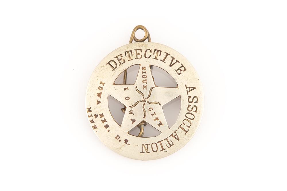 Very early "Detective Association Sioux City, Iowa": Very early "Detective Association Sioux City, Iowa" Badge, "Iowa - Neb - Minn. - D.T. (Dakota Territory), 2" circle / star, pre-1900. GEORGE JACKSON ESTATE