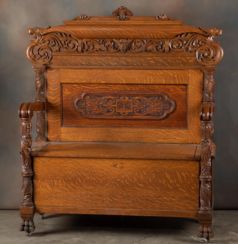 Beautiful and ornate antique, American quarter sawn oak: Beautiful and ornate antique, American quarter sawn oak lift seat Hall Bench, circa 1900-1910, excellent finish and condition, 55" tall x 50" wide x 20" deep.