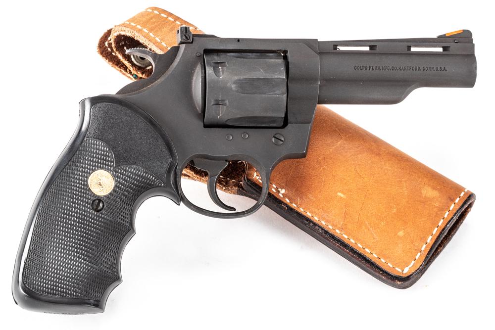 Colt, Peace Keeper, Double Action Revolver, .357 MAG: Colt, Peace Keeper, Double Action Revolver, .357 MAG caliber, SN 46812V, matte finish, 4" barrel, set of black Pachmayr two-piece checkered grips with gold Colt Medallions. Very nice overall condition