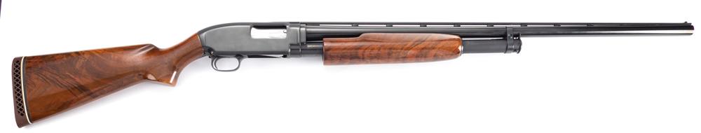 High condition Winchester, Model 12, 12 gauge, Pump: High condition Winchester, Model 12, 12 gauge, Pump Shotgun, SN 1692174, blue finish, 30" ribbed barrel, burl walnut stock and forend, with "Blackburn Custom Stocks, Ft. Worth, Texas" recoil pad. Very