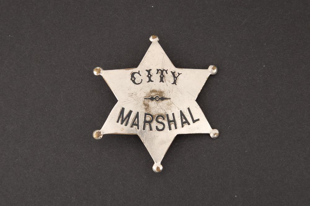 City Marshal Badge, stock, 6 point ball star, 2 1/2": City Marshal Badge, stock, 6 point ball star, 2 1/2" across points, turn of the century. GEORGE JACKSON ESTATE