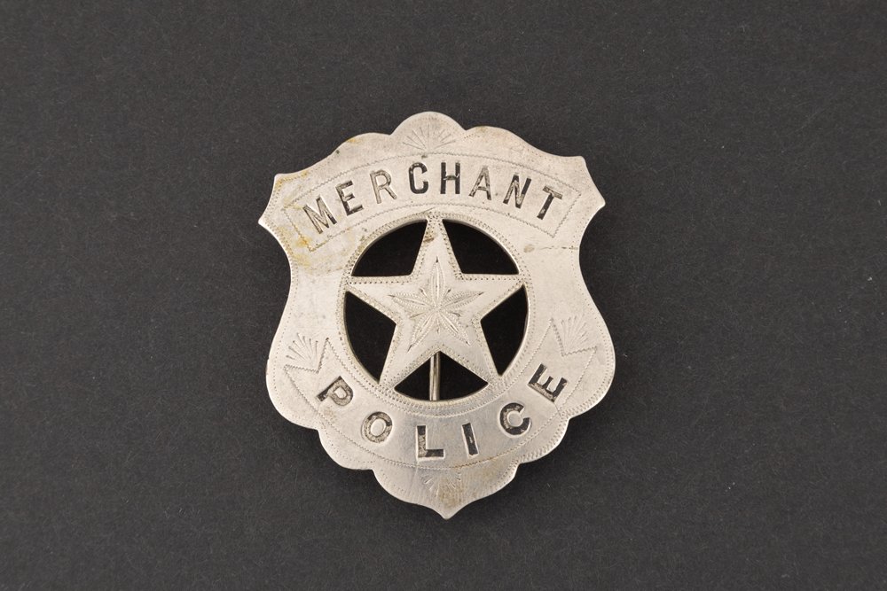 Merchant Police Badge, shield with cut out 5 point: Merchant Police Badge, shield with cut out 5 point star, 2 1/8" tall, hallmark "C.D. Reese, 57 Warren St., N.Y.", early 1900s. GEORGE JACKSON ESTATE