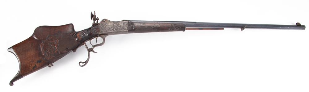 Schultzen Nordheim Mehlis, Single Shot Target Rifle,: Schultzen Nordheim Mehlis, Single Shot Target Rifle, bore shows it to be a .7.65 caliber, SN NV, 30" octagon barrel with heavily engraved receiver and lever, beautiful carved walnut stock and forend, 