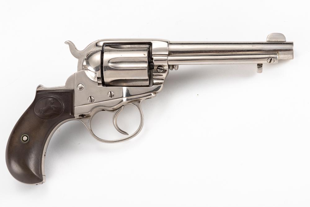 Colt, Model 1877, Double Action Revolver, .38 LONG COLT: Colt, Model 1877, Double Action Revolver, .38 LONG COLT caliber, SN 132604, 4 1/2" barrel, shows to have been renickeled, original Colt grips, good bore. MODERN