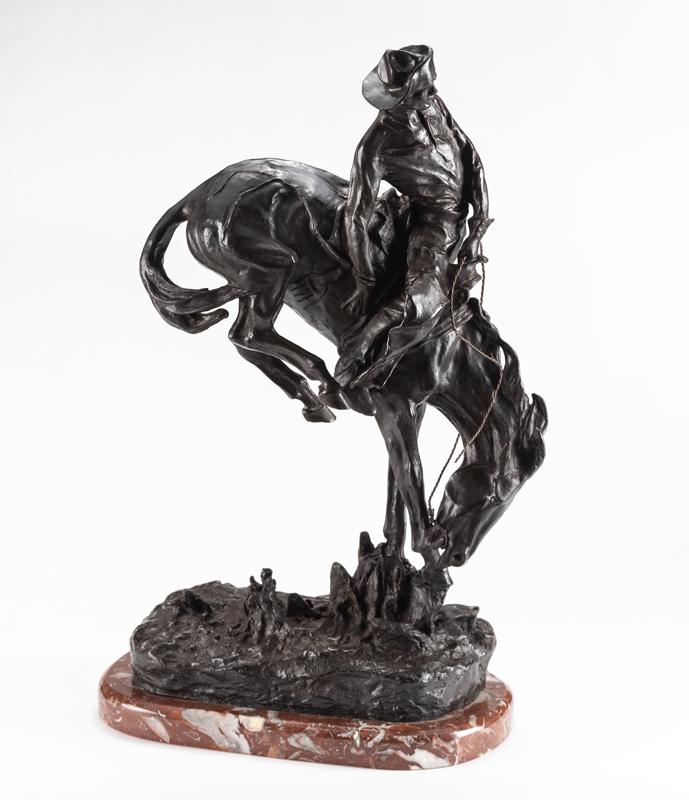 Bronze Sculpture marked "Copyright by Frederic: Bronze Sculpture marked "Copyright by Frederic Remington", titled "Outlaw". Sculpture is 23" tall x 14" long x 8" deep on heavy marble base.