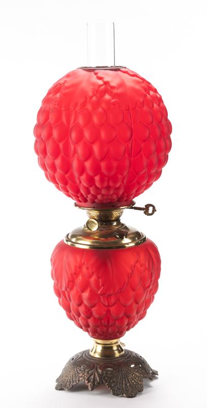 Antique red Gone With the Wind Lamp in very desirable: Antique red Gone With the Wind Lamp in very desirable hanging grape pattern, 10" ball shade and matching base, made by Success Lamp Co., has been converted from oil to electricity. Lighted top and bas