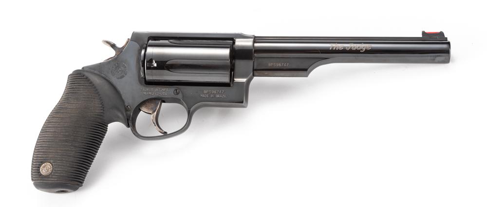 Taurus, The Judge, Double Action Revolver, .410/45: Taurus, The Judge, Double Action Revolver, .410/45 caliber, SN BP598747, blue finish, 6 1/2" barrel, "Taurus" marked rubber grips, chambered for a 2 1/2" shell, overall very good condition with light 