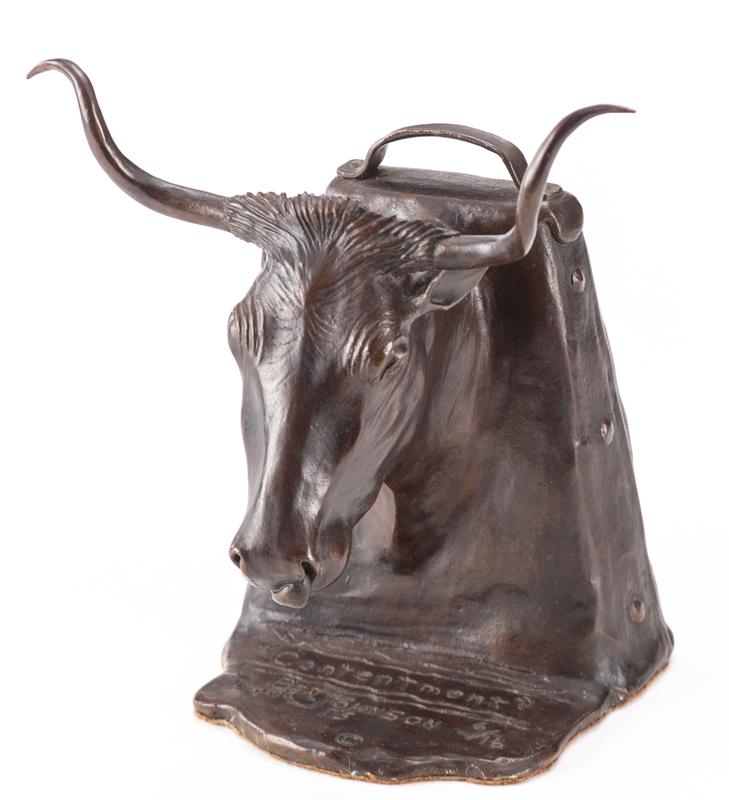 Original Bronze Sculpture of a Long Horn Steer mounted: Original Bronze Sculpture of a Long Horn Steer mounted on a cow bell, marked "Ben Johnson, 1975, #6/16", titled "Contentment", 4 1/2" wide x 7" tall to top of horn.