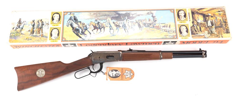 New in box Winchester, Legendary Lawman Model 94,: New in box Winchester, Legendary Lawman Model 94, Saddle Ring Carbine, .30/30 caliber, SN LL09817, blue 16" barrel with case hardened engraved receiver and inlaid silver plaque in stock. Sold in origi