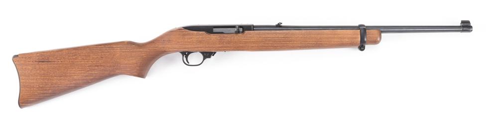 New in box Ruger, Model 10/22, Semi-Automatic Carbine,: New in box Ruger, Model 10/22, Semi-Automatic Carbine, .22 LR caliber, SN 254-54240, blue finish, 18" barrel, wood stock. Sold in original card board shipping box with paper work. MODERN
