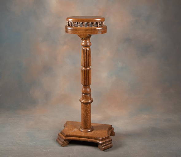 Beautiful quarter sawn oak, footed pedestal Chap Stand with unique