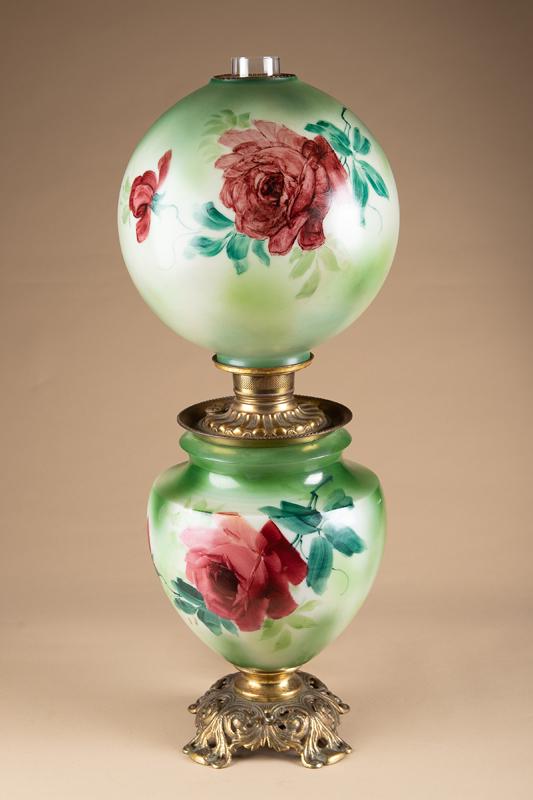 Large oversized, Gone With The Wind Lamp, with hand painted floral base and shade, measures 30: Large oversized, Gone With The Wind Lamp, with hand painted floral base and shade, measures 30 inches tall, with 12 inch ball shade on top. Wick spreader is marked "Made in America." Has brass font an