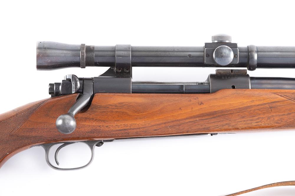 Winchester, Model 70, Bolt Action Rifle, .30/06 caliber, SN 51699, blue finish, 24" barrel, with: Winchester, Model 70, Bolt Action Rifle, .30/06 caliber, SN 51699, blue finish, 24" barrel, with checkered walnut stock. Pachmayr recoil pad, factory swivels with leather carry strap. Mounted with an 