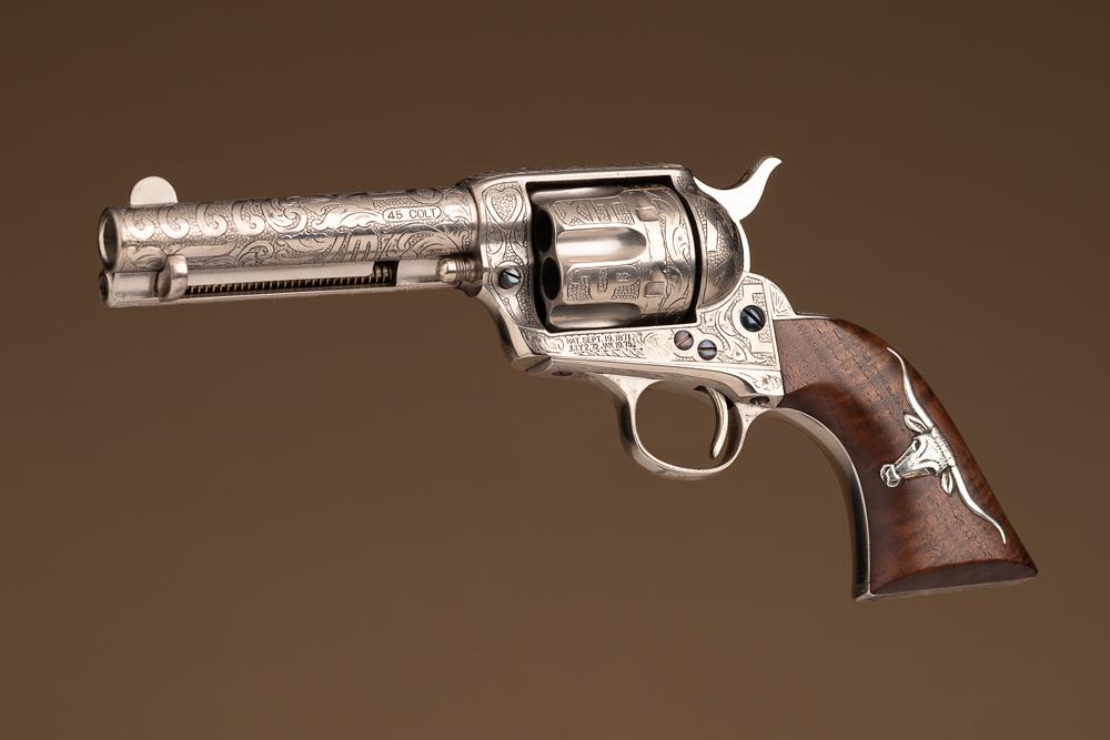 ATTENTION COLLECTORS, THE TWO FOLLOWING LOTS ARE MATCHING ENGRAVED SINGLE ACTION REVOLVERS BY MASTER: ATTENTION COLLECTORS, THE TWO FOLLOWING LOTS ARE MATCHING ENGRAVED SINGLE ACTION REVOLVERS BY MASTER ENGRAVER DAVID HARRIS. Fine full engraved Colt, SAA Army Revolver, .45 Colt caliber, SN 281070, man