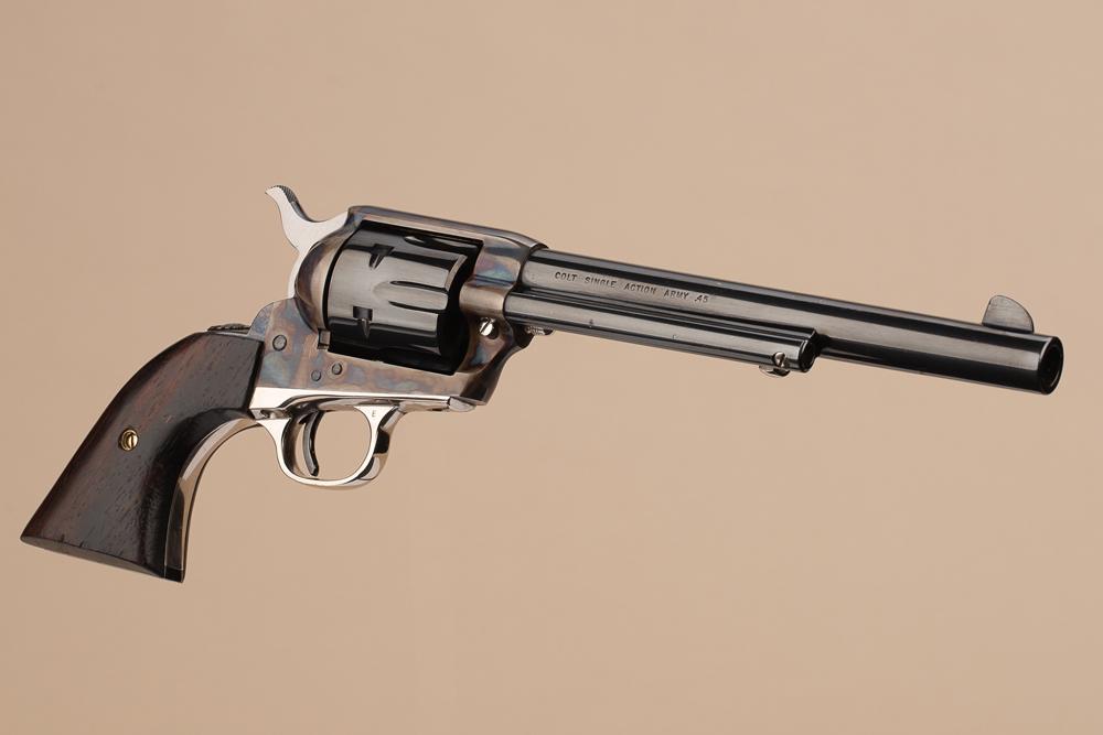 Cased Texas Ranger Colt Commemorative Revolver, .45 caliber, SN 806TR, 7 1/2" barrel, blue finish,: Cased Texas Ranger Colt Commemorative Revolver, .45 caliber, SN 806TR, 7 1/2" barrel, blue finish, case hardened receiver, with nickel silver trigger guard. Rosewood grips with miniature silver Ranger