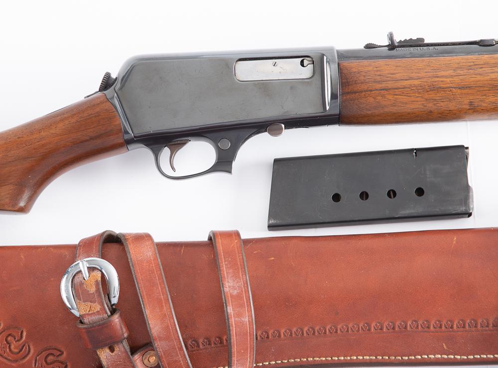 Winchester, Model 1940, Semi-Auto Rifle, .351 caliber, SN 47508, 20" round barrel, blue finish,: Winchester, Model 1940, Semi-Auto Rifle, .351 caliber, SN 47508, 20" round barrel, blue finish, nice finish on wood with some minor handling marks. Rifle is accompanied by a leather holster manufactur