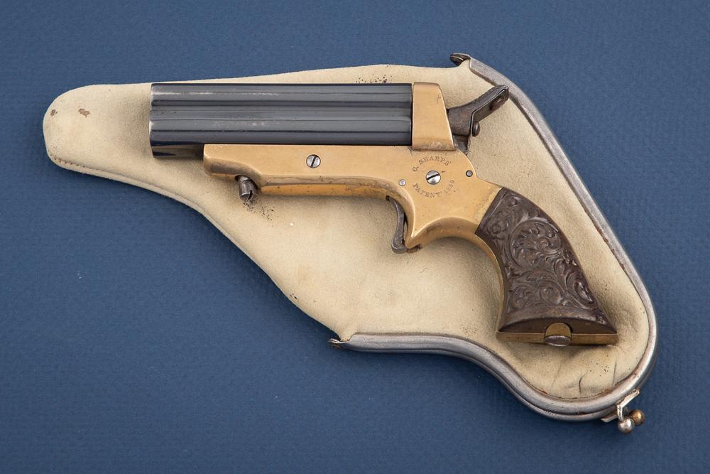 Antique Sharps Pepperbox Derringer in .30 caliber, SN 346, Model 2E with leather purse/pouch. This: Antique Sharps Pepperbox Derringer in .30 caliber, SN 346, Model 2E with leather purse/pouch.This nice little 4 barrel Pepperbox has nearly 100% bluing on the barrel cluster and hasgenerous amounts of