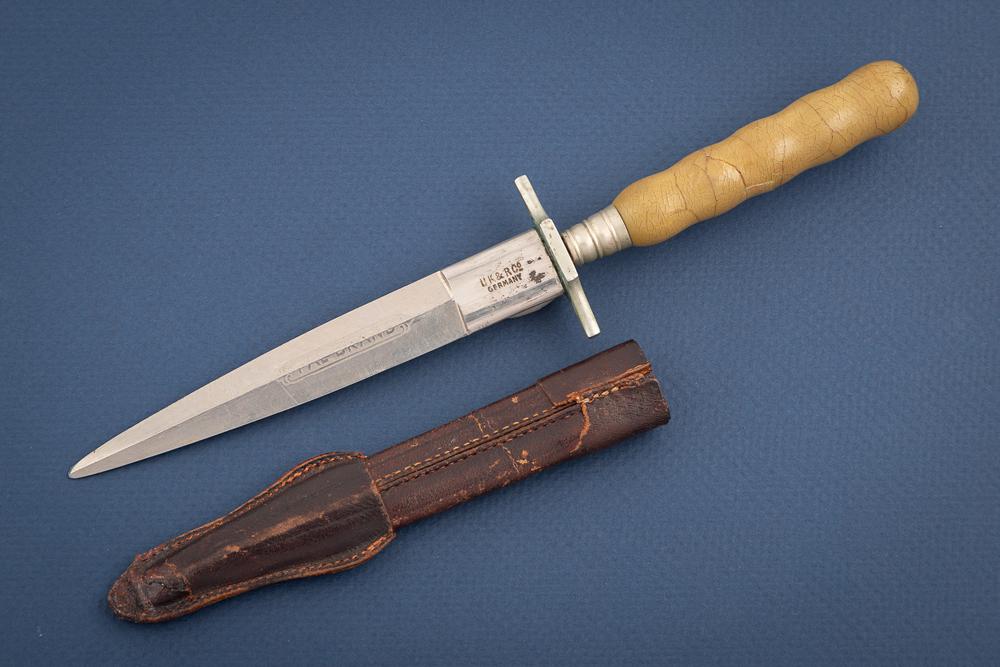 Vintage Dagger marked "UK & R Co / Germany" and etched â€œPAL BRAND" on the 5â€ blade. The round: Vintage Dagger marked "UK & R Co / Germany" and etched â€œPAL BRAND" on the 5” blade.The round handle is 3 7/8”. It is accompanied by an ornate leather sheath.