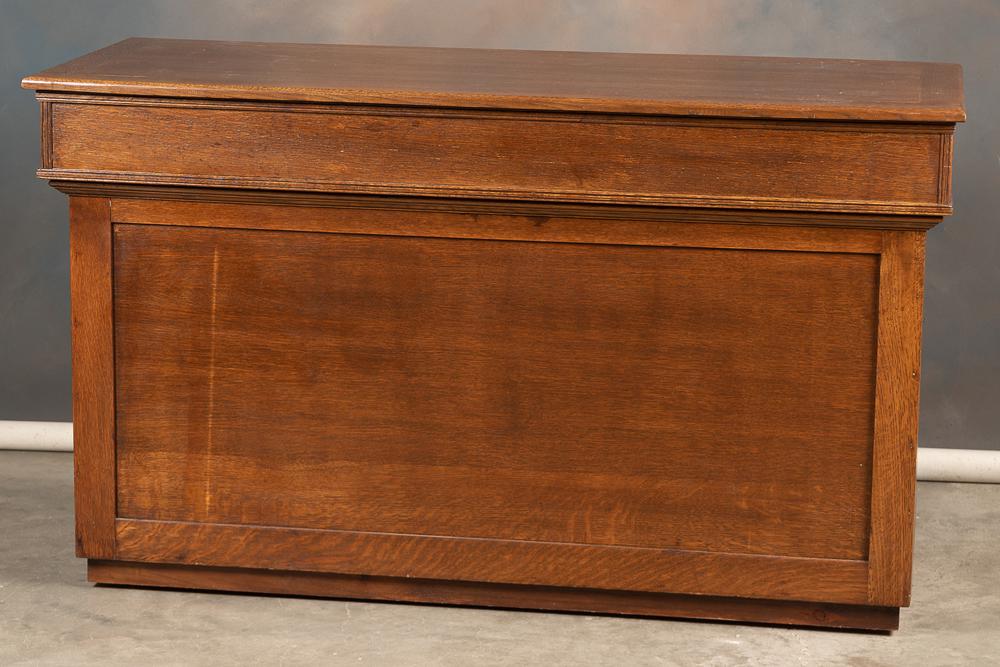 High quality antique quarter sawn oak country store Counter, circa 1900, case has 3 drawers in back: High quality antique quarter sawn oak country store Counter, circa 1900, case has 3 drawers in back with sliding glass panel doors. Case is mounted on rollers for easy moving. Excellent finish and con