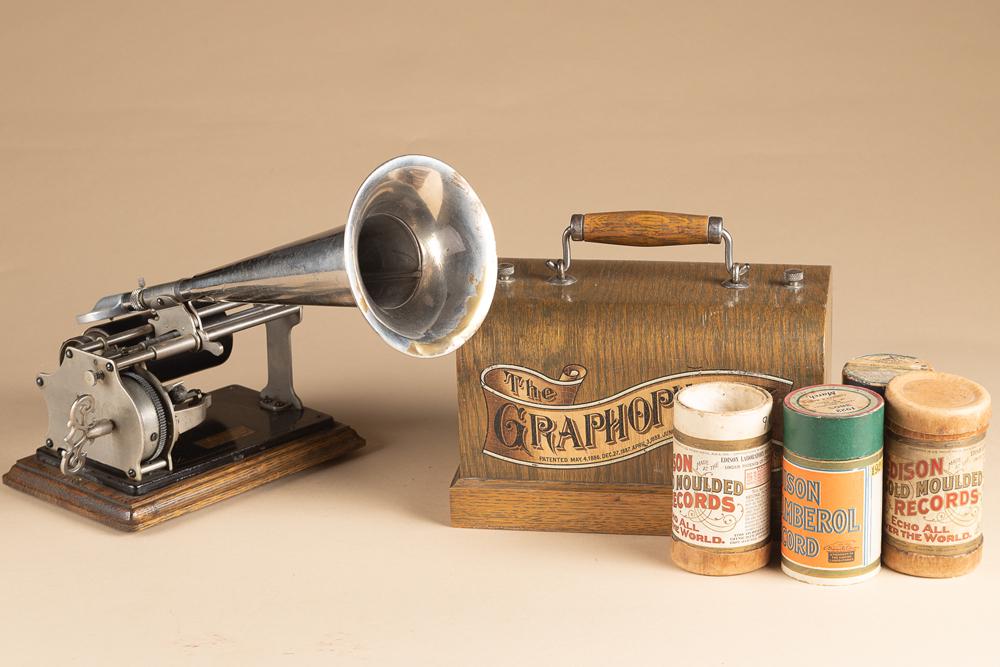 Antique Graphophone, oak case Cylinder Player, in original oak case finish with beehive top, marked: Antique Graphophone, oak case Cylinder Player, in original oak case finish with beehive top, marked "Graphophone and Columbia Records were awarded the Grand Prize at the Paris Exposition of 1900." In