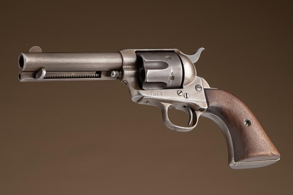 Antique Black Powder Colt, Single Action Revolver, .45 caliber, SN 94049, manufactured 1893, 4 1/4": Antique Black Powder Colt, Single Action Revolver, .45 caliber, SN 94049, manufactured 1893, 4 1/4" barrel, no remaining finish but has nice even light brown patina. Carved steer head wooden grips, bo