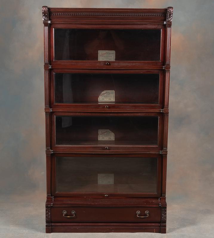 Beautiful antique four stack, mahogany Bookcase by "Globe Wernicke Co." in the rarest most desirable: Beautiful antique four stack, mahogany Bookcase by "Globe Wernicke Co." in the rarest most desirable model, "The Ideal." Circa 1910, in excellent finish and condition considered "The Cadillac Model" o