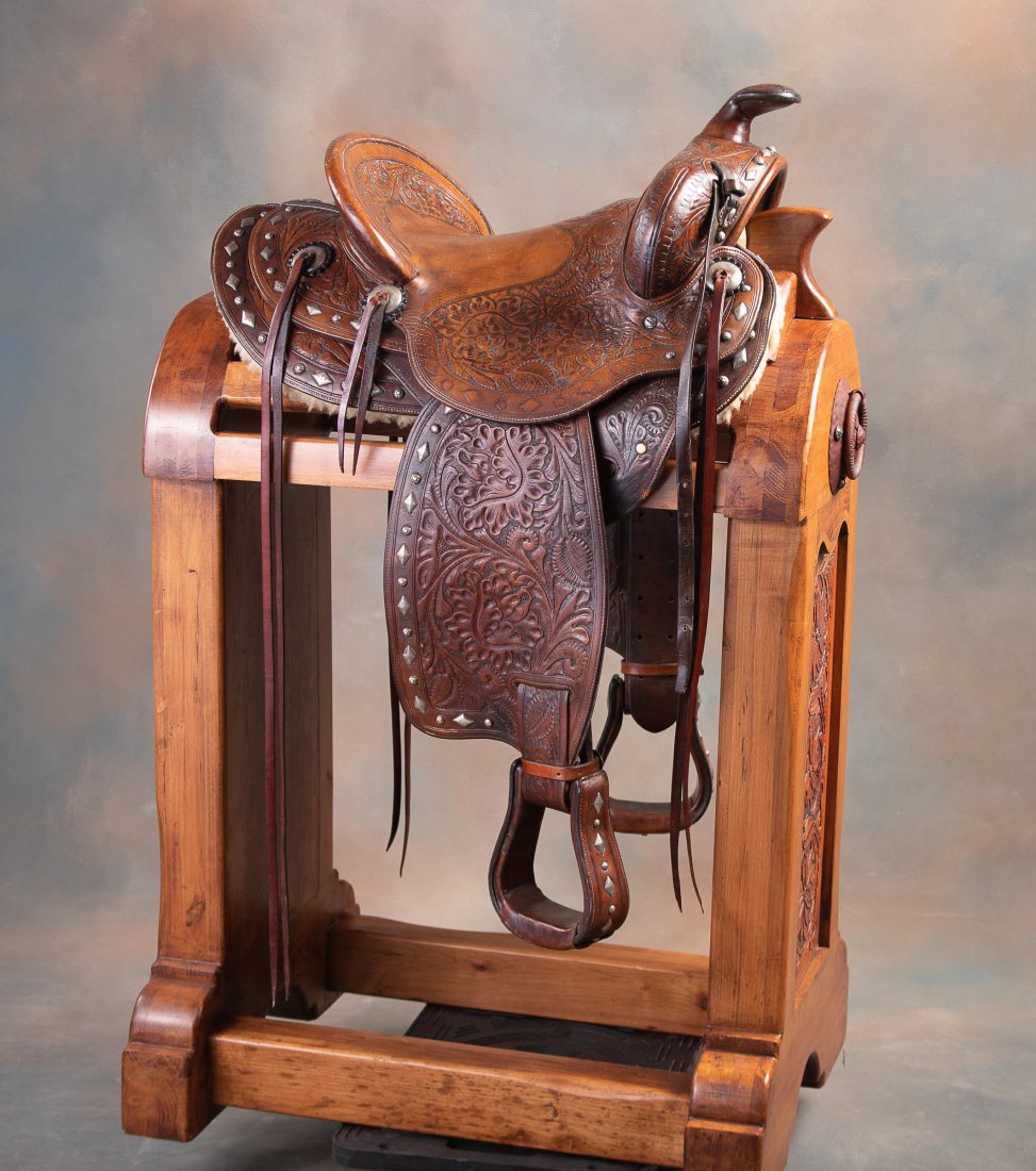 Scarce brown tooled "Bohlin" marked Saddle with silver mountings, 15" seat with sterling silver: Scarce brown tooled "Bohlin" marked Saddle with silver mountings, 15" seat with sterling silver shield mounted in front of seat. Sheild is marked, "Edward H. Bohlin, Hollywood, CA." Saddle has 3 1/4"