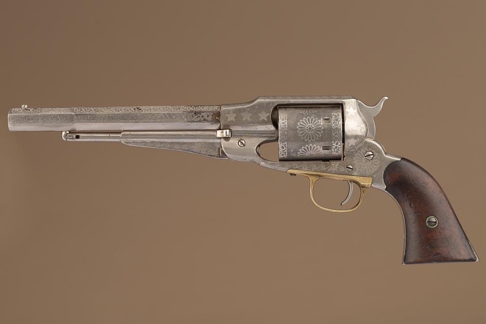 Antique engraved Remington, New Model, Army Revolver, SN 20450 with Texas Ranch History.: Antique engraved Remington, New Model, Army Revolver, SN 20450 with Texas Ranch History. Transitional Model between the percussion revolvers and the standard conversion revolvers. Manufactured circa 1